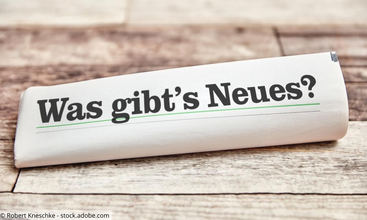 Zeitungsrolle mit der Überschrift "Was gibt's Neues?"